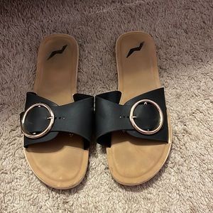 Sandals with a buckle